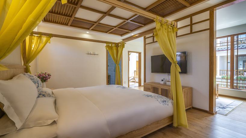 Imagen de la habitación del Hotel Floral &middot; Rushuang Courtyard Lijiang. Foto 4