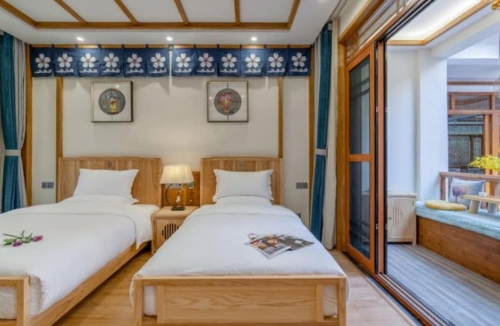 Imagen de la habitación del Hotel Floral &middot; Rushuang Courtyard Lijiang. Foto 6