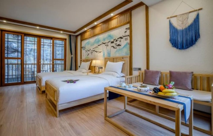 Imagen de la habitación del Hotel Floral &middot; Rushuang Courtyard Lijiang. Foto 7