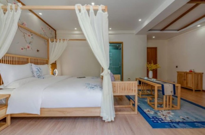 Imagen de la habitación del Hotel Floral &middot; Rushuang Courtyard Lijiang. Foto 8