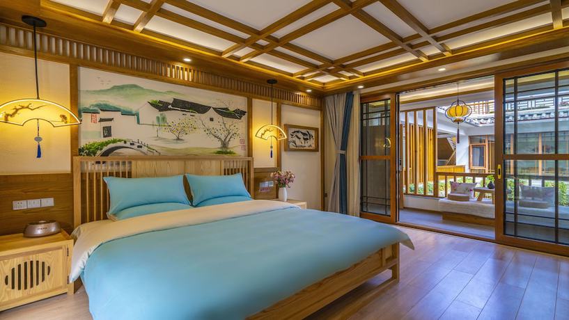 Imagen de la habitación del Hotel Floral &middot; Rushuang Courtyard Lijiang. Foto 9