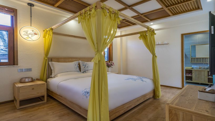 Imagen de la habitación del Hotel Floral &middot; Rushuang Courtyard Lijiang. Foto 11