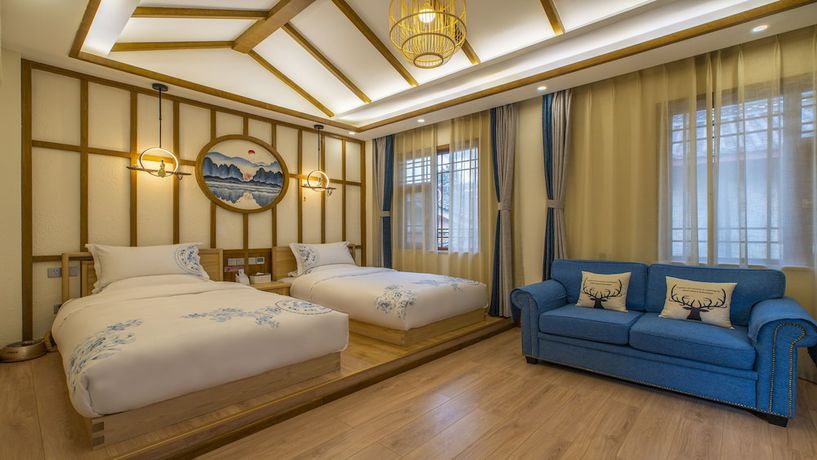Imagen de la habitación del Hotel Floral &middot; Rushuang Courtyard Lijiang. Foto 12