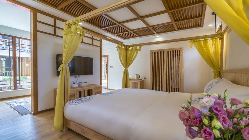 Imagen de la habitación del Hotel Floral &middot; Rushuang Courtyard Lijiang. Foto 13