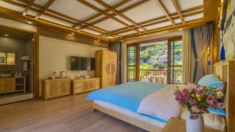 Imagen de la habitación del Hotel Floral &middot; Rushuang Courtyard Lijiang. Foto 14