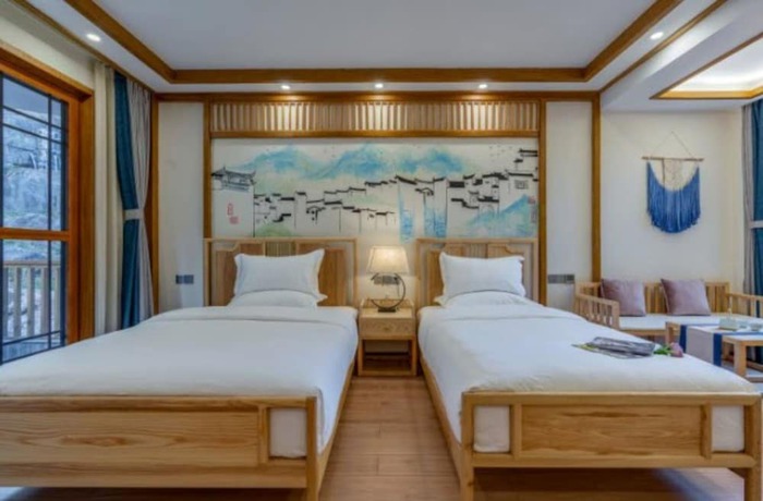 Imagen de la habitación del Hotel Floral &middot; Rushuang Courtyard Lijiang. Foto 17