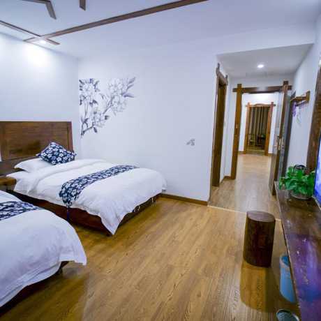 Imagen de la habitación del Hotel Floral &middot; Spring Guesthouse Zhangjiajie. Foto 3