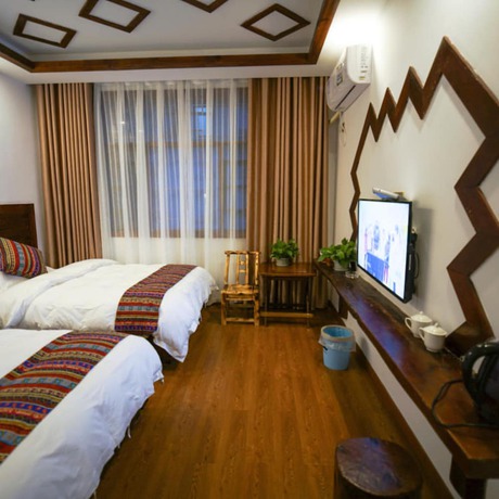 Imagen de la habitación del Hotel Floral &middot; Spring Guesthouse Zhangjiajie. Foto 4