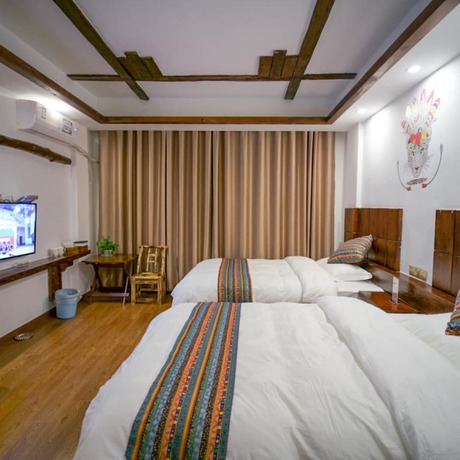 Imagen de la habitación del Hotel Floral &middot; Spring Guesthouse Zhangjiajie. Foto 6