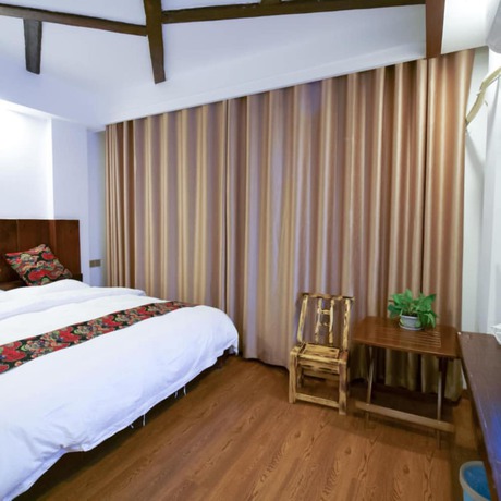 Imagen de la habitación del Hotel Floral &middot; Spring Guesthouse Zhangjiajie. Foto 7