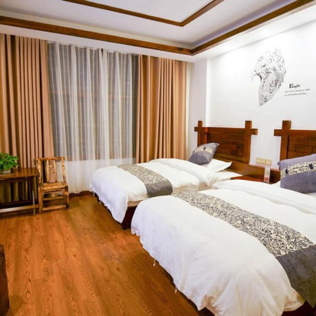 Imagen de la habitación del Hotel Floral &middot; Spring Guesthouse Zhangjiajie. Foto 9