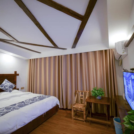 Imagen de la habitación del Hotel Floral &middot; Spring Guesthouse Zhangjiajie. Foto 10