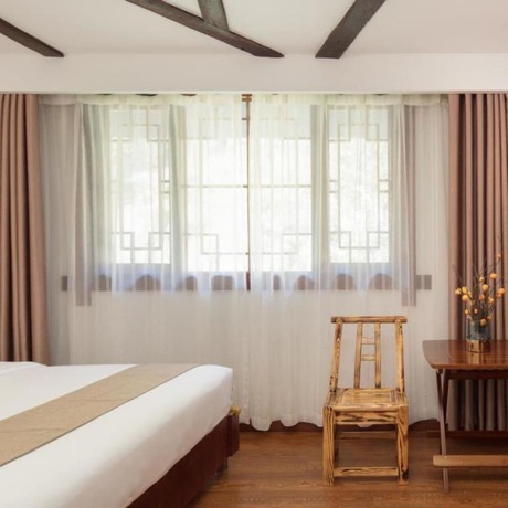 Imagen de la habitación del Hotel Floral &middot; Spring Guesthouse Zhangjiajie. Foto 14