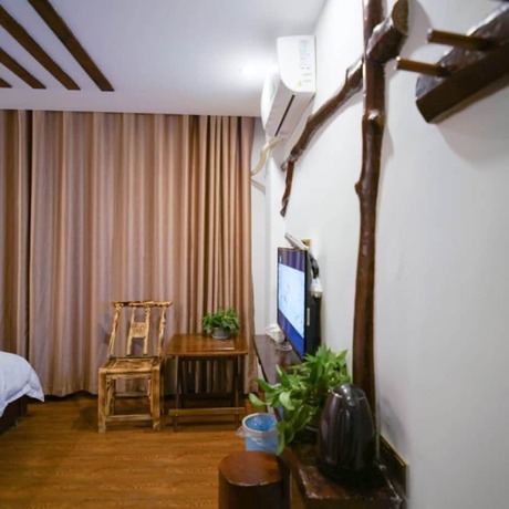 Imagen de la habitación del Hotel Floral &middot; Spring Guesthouse Zhangjiajie. Foto 16