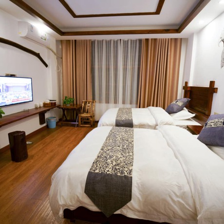 Imagen de la habitación del Hotel Floral &middot; Spring Guesthouse Zhangjiajie. Foto 17