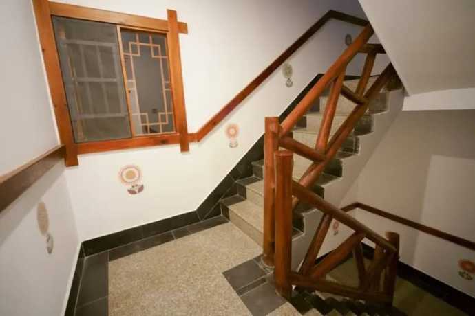 Imagen de los interiores del Hotel Floral &middot; Spring Guesthouse Zhangjiajie. Foto 20