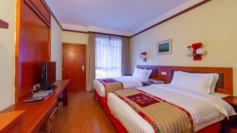 Imagen de la habitación del Hotel Floral &middot; Yi Xing Lijiang. Foto 10