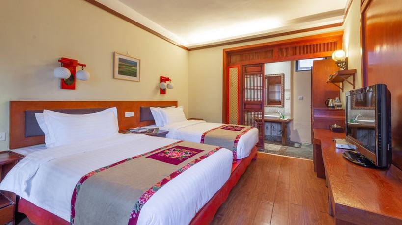 Imagen de la habitación del Hotel Floral &middot; Yi Xing Lijiang. Foto 12
