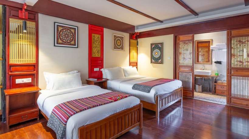 Imagen de la habitación del Hotel Floral &middot; Yi Xing Lijiang. Foto 17