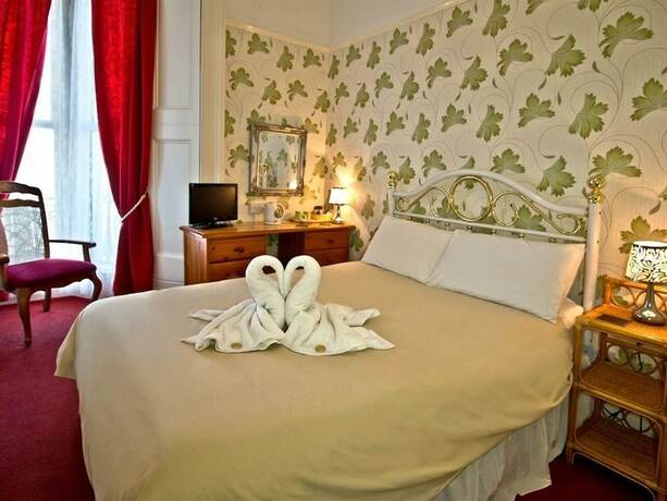Imagen de la habitación del Hotel Florence Guest House. Foto 17
