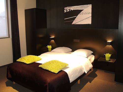 Imagen de la habitación del Hotel Florent. Foto 9