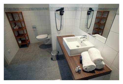 Imagen de la habitación del Hotel Florent. Foto 10