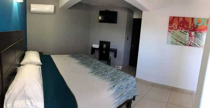 Imagen de la habitación del Hotel Flores. Foto 11