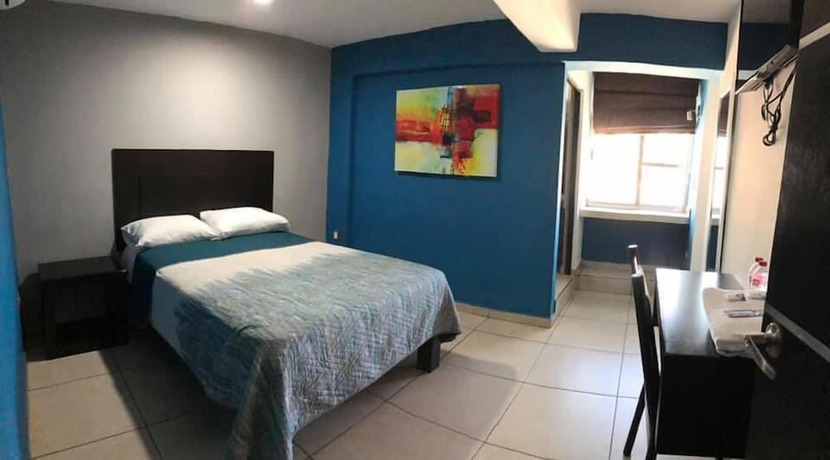 Imagen de la habitación del Hotel Flores. Foto 17