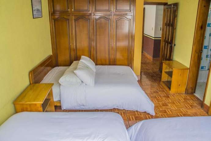 Imagen de la habitación del Hotel Flores Los Ponchos. Foto 6