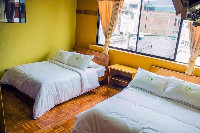 Imagen de la habitación del Hotel Flores Los Ponchos. Foto 7