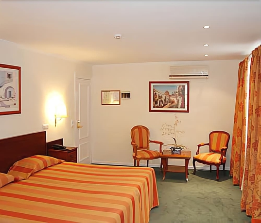 Imagen de la habitación del Hotel Florescente. Foto 4