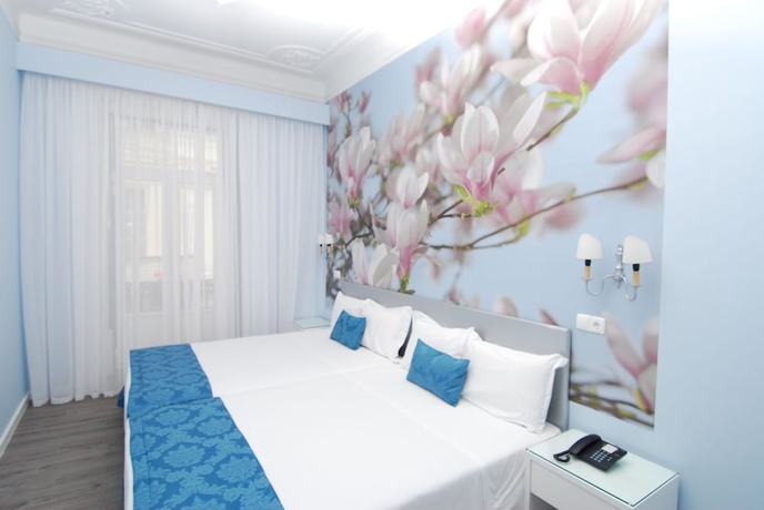 Imagen de la habitación del Hotel Florescente. Foto 5