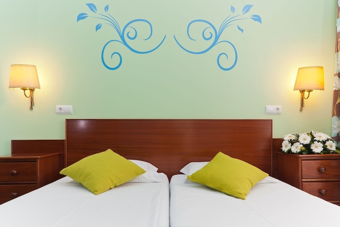 Imagen de la habitación del Hotel Florescente. Foto 6