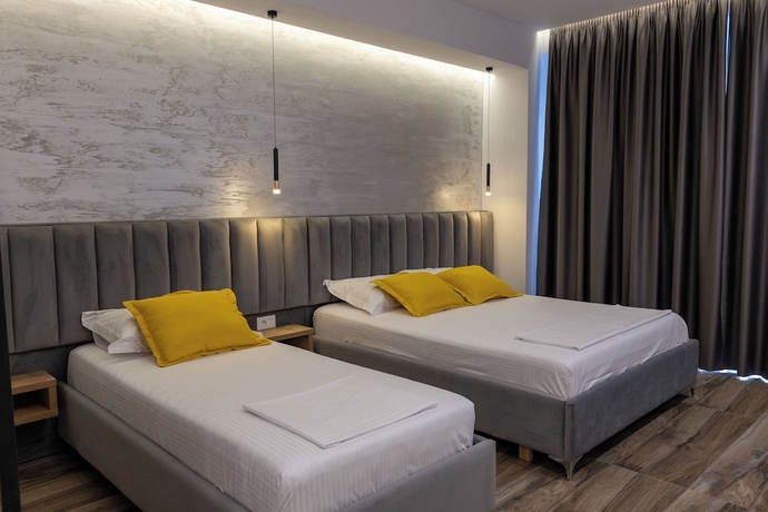 Imagen de la habitación del Hotel Flori. Foto 2