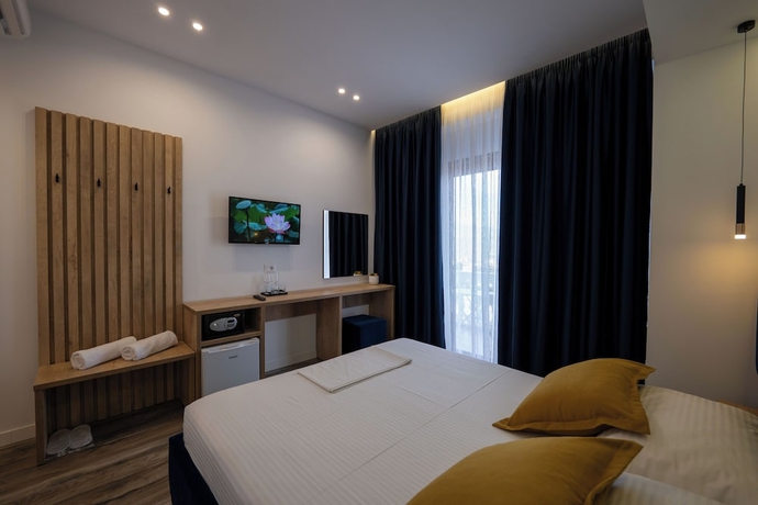 Imagen de la habitación del Hotel Flori. Foto 11