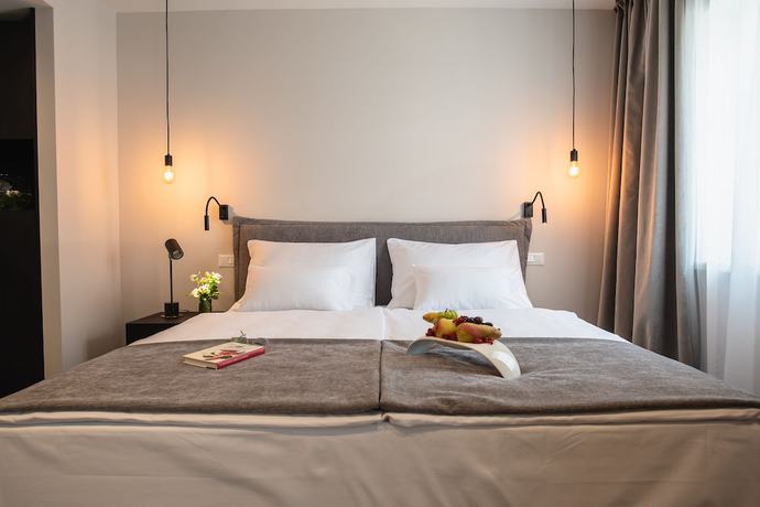 Imagen de la habitación del Hotel Florian and Godler. Foto 2