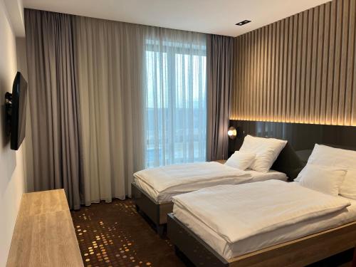 Imagen de la habitación del Hotel Flow & Conference. Foto 19