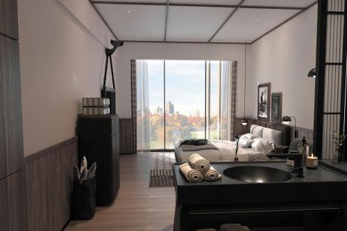 Imagen de la habitación del Hotel Flow and Co. Qingdao, Autograph Collection. Foto 15