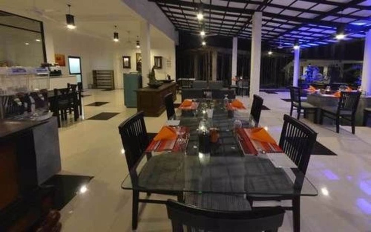 Imagen del bar/restaurante del Hotel Flower Garden Eco Village. Foto 14