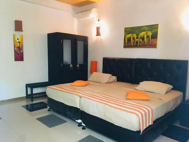 Imagen de la habitación del Hotel Flower Garden Eco Village. Foto 16