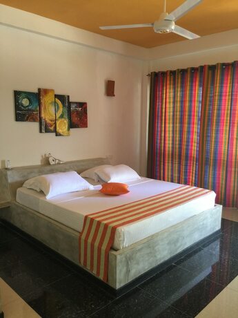 Imagen de la habitación del Hotel Flower Garden Eco Village. Foto 17