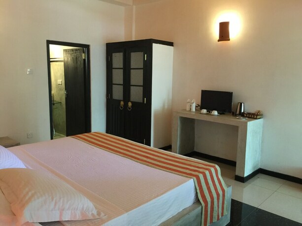 Imagen de la habitación del Hotel Flower Garden Eco Village. Foto 22