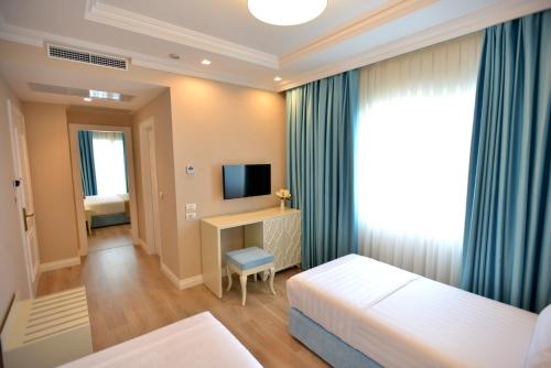 Imagen de la habitación del Hotel Flower Hotels & Resorts. Foto 8