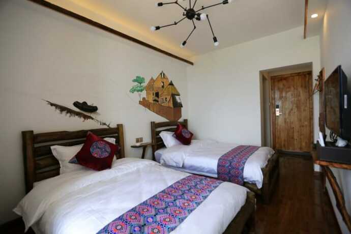 Imagen de la habitación del Hotel Flower House. Foto 12