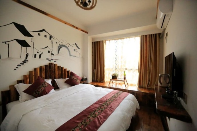 Imagen de la habitación del Hotel Flower House. Foto 13