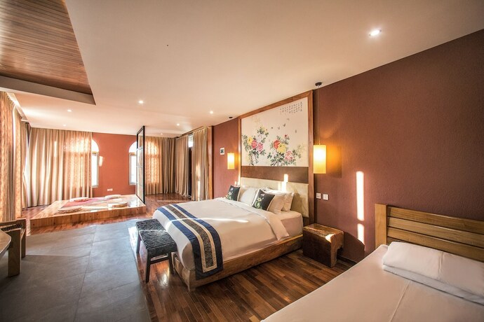 Imagen de la habitación del Hotel Flower Place Inn. Foto 15