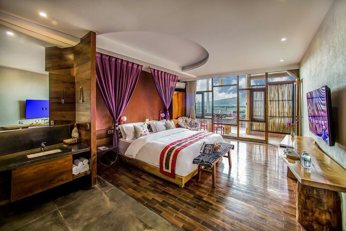 Imagen de la habitación del Hotel Flower Place Inn. Foto 17