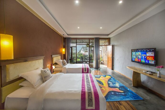 Imagen de la habitación del Hotel Flower Place Inn. Foto 18