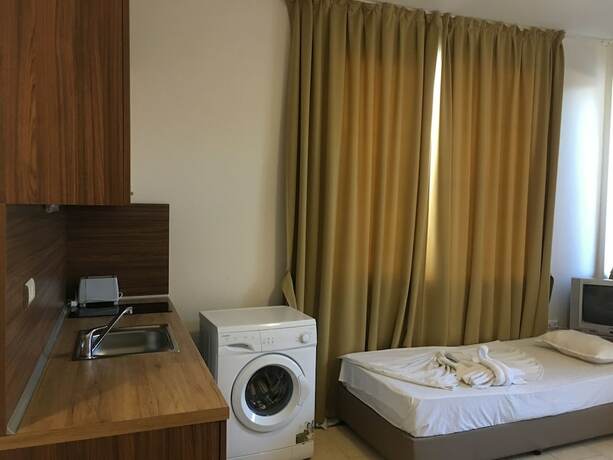 Imagen de la habitación del Hotel Flower Street Luxury Studios in Palm Residence. Foto 7