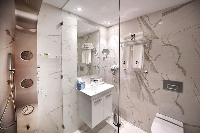 Imagen de la habitación del Hotel Flower Town and Spa. Foto 10